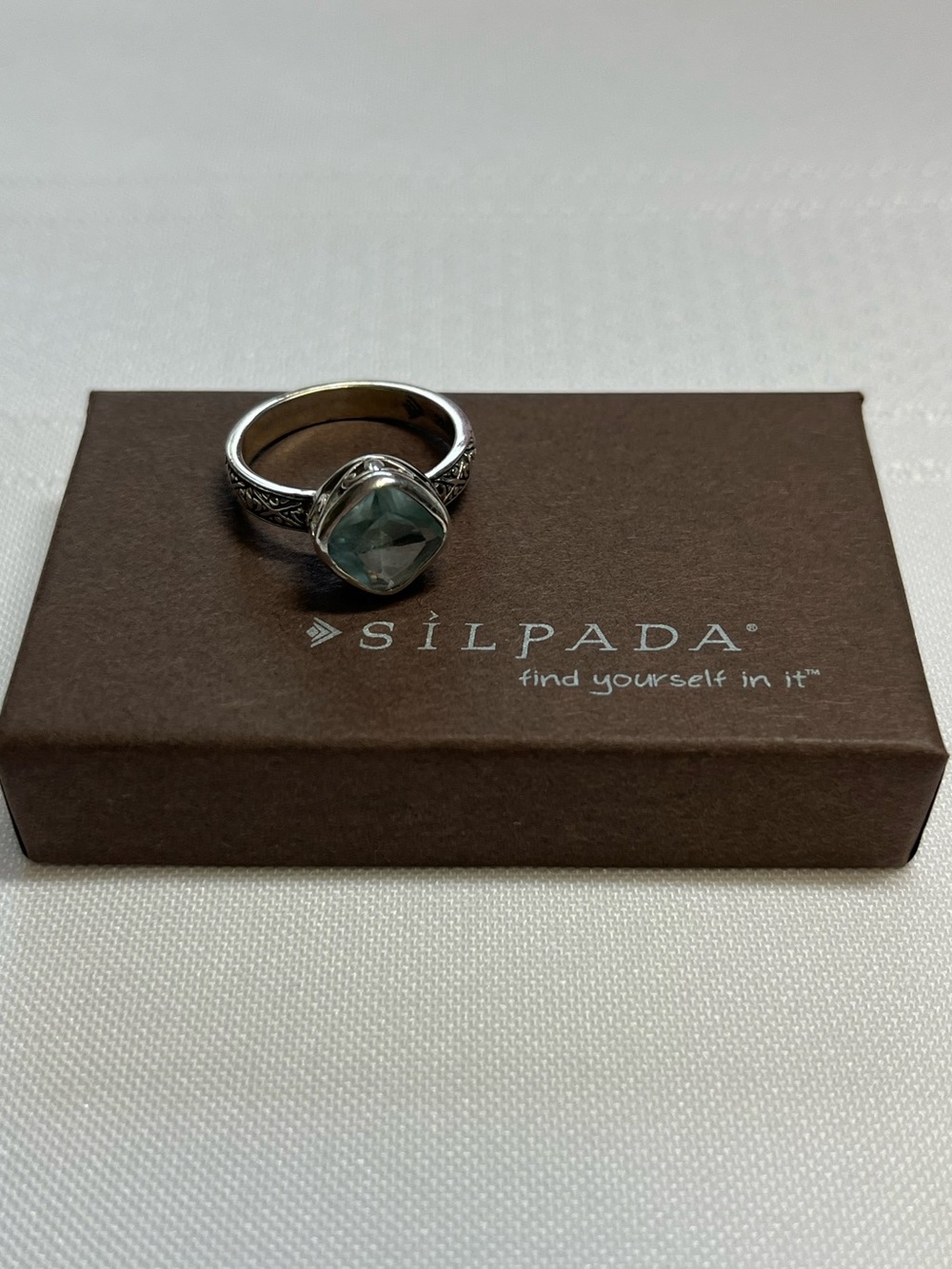 Silpada retired Sterling silver Filigree band with Aqua blue stone. Size 6.5